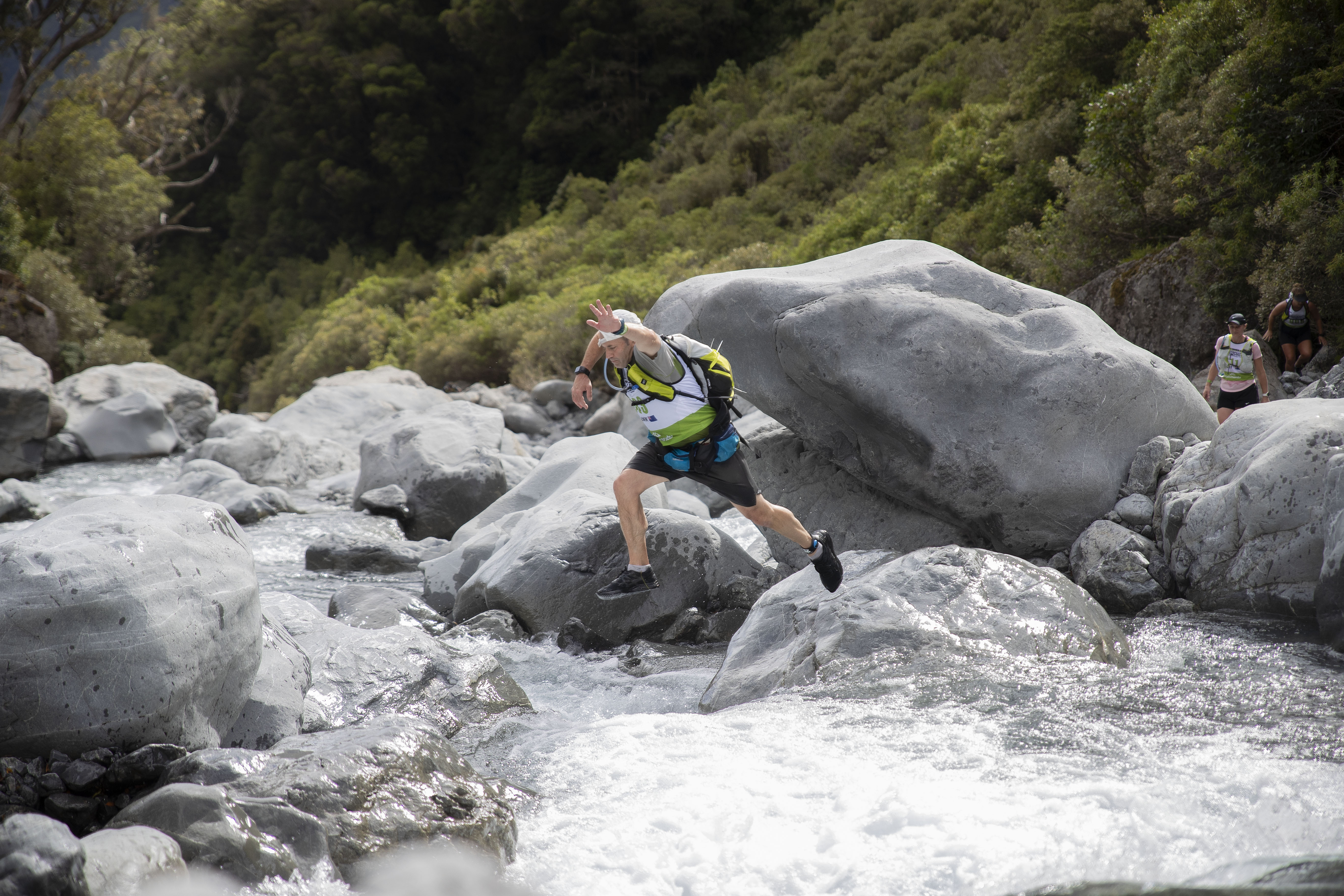 Glenn Livingstone jumping the river in a place known as the Leap of Faith river crossing during the Coast to Coast event